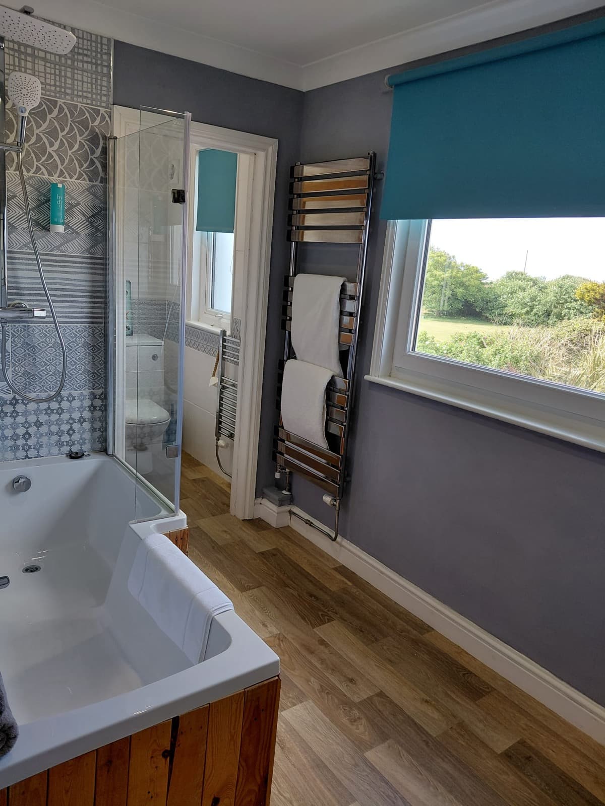A guest bathroom at Seals Bacton with a window view