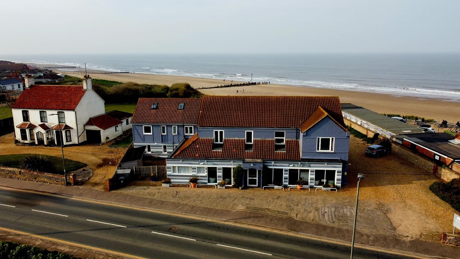 Seals Bacton from Walcott Road with the coast behind